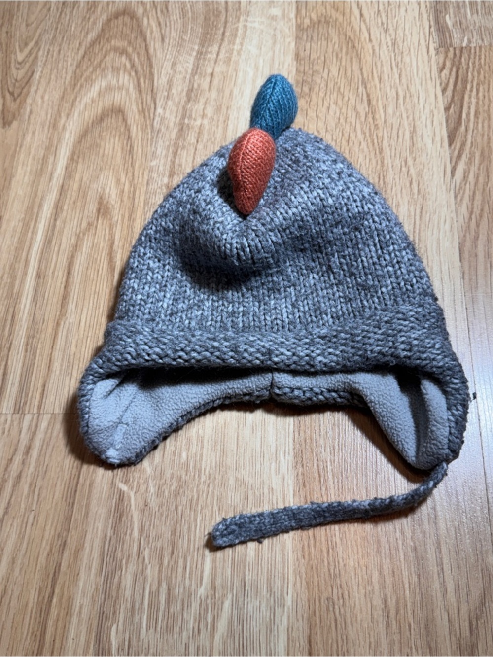 Kids Gray Knit Earflap Hat with Orange and Teal Accents Dinosaur spikes